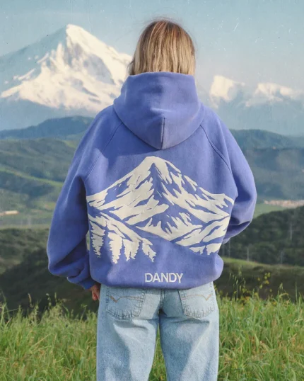 Premium heavyweight fabric with a soft vintage-washed finish Bold mountain graphic in high-density puff print