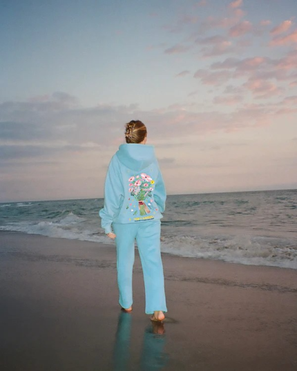 Color: Sky blue/powder blue Waist: Elastic waistband with drawstring closure Material: Premium cotton-blend fleece (soft brushed interior) Embroidery: Colorful floral design on thigh